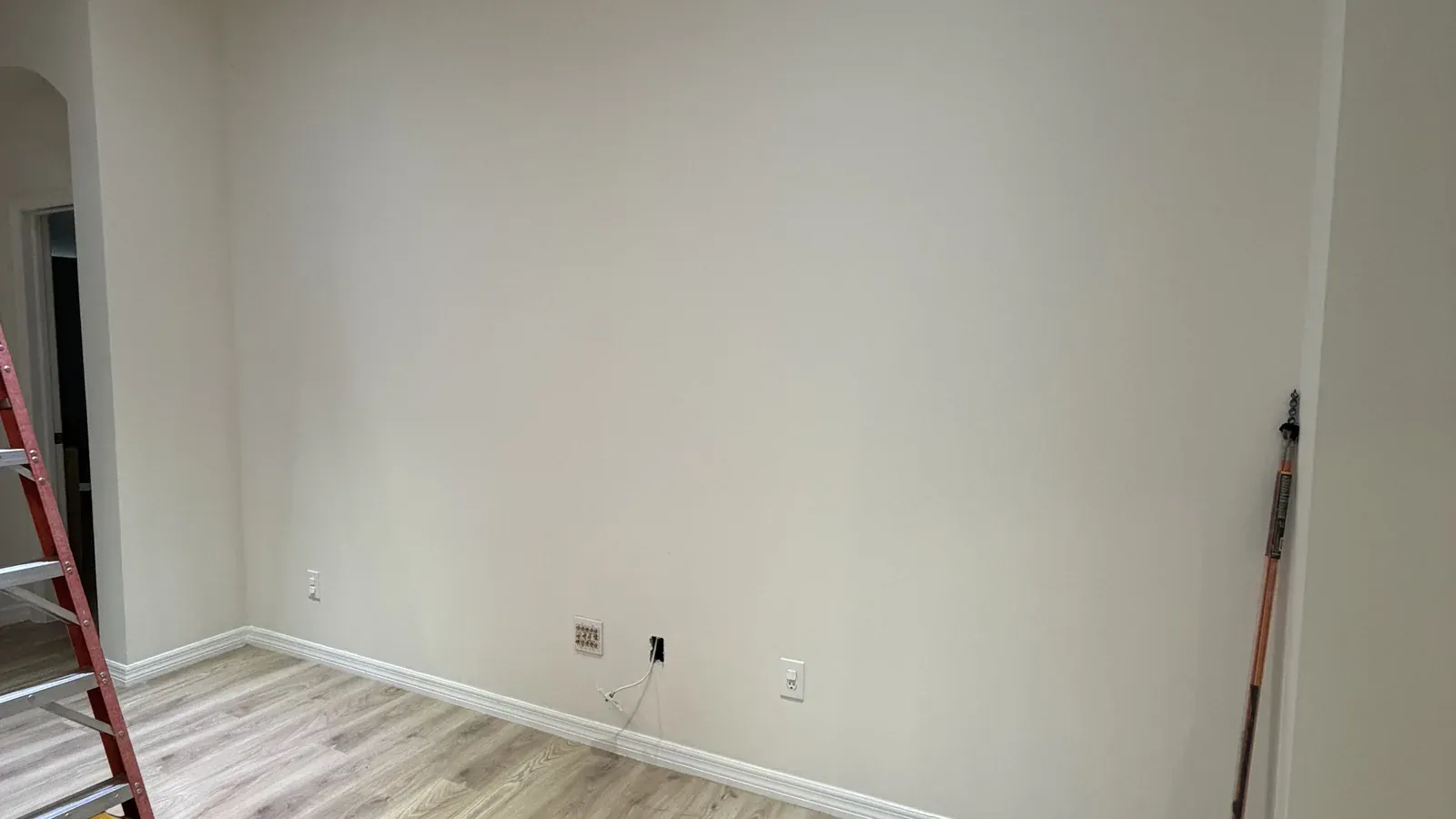 Blank living room wall before trim work