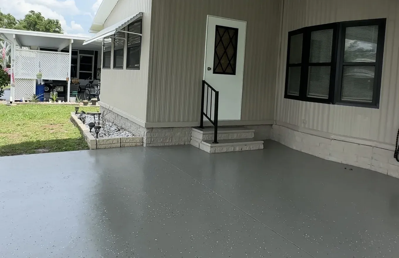 Repainted home exterior with fresh siding and trim